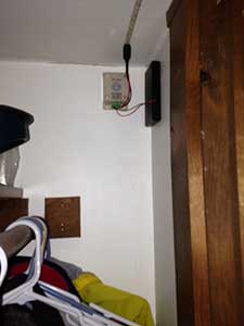 Motion sensor and battery pack location for closet led lighting
