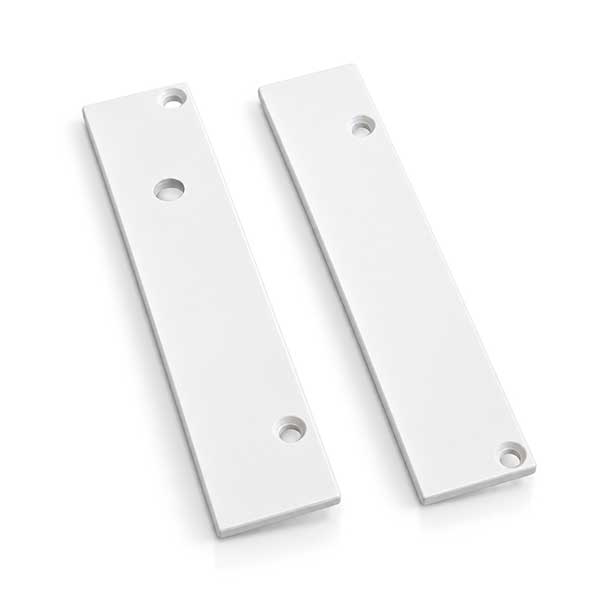 Matching white baseboard channel end caps, one with an additional cable-entry opening
